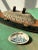 Vintage Folk Art Hand-Painted "US Eagle C.G." Clam Shell, Circa 1950s. Natural half clamshell with a hand-painted ship on...