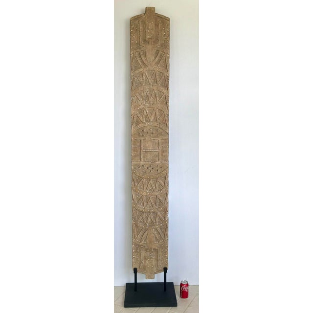 Original retail $1880, stylish Revelation Tribal Mango Wood Large Forebearers Etching Sculpture, black metal base,...