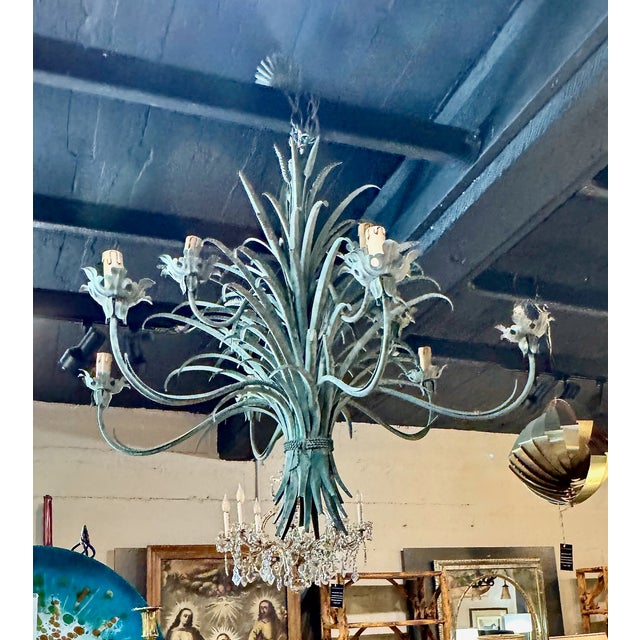 This is an unusual mid-century Coco Chanel-inspired chandelier based om the famous “Sheaf of wheat” tables designed by...