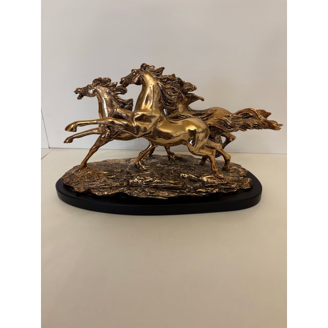 For your buying pleasure I have listed this beautiful resin and bronze with a wood base of wild running stallions...