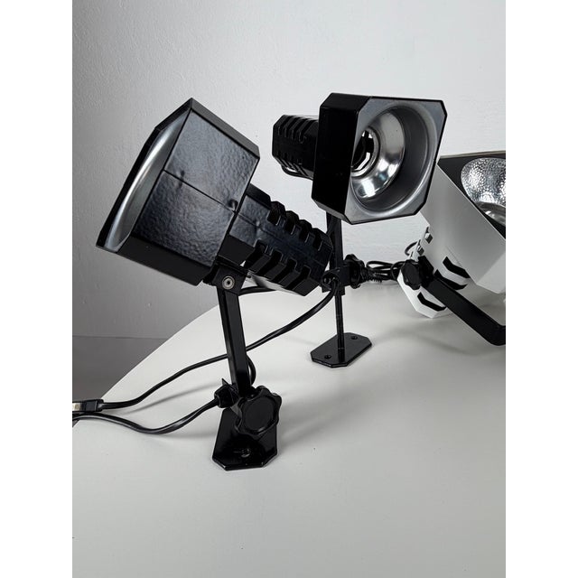 Set of four vintage Flipper lamps in two different sizes. A striking example of technical and industrial design from the...