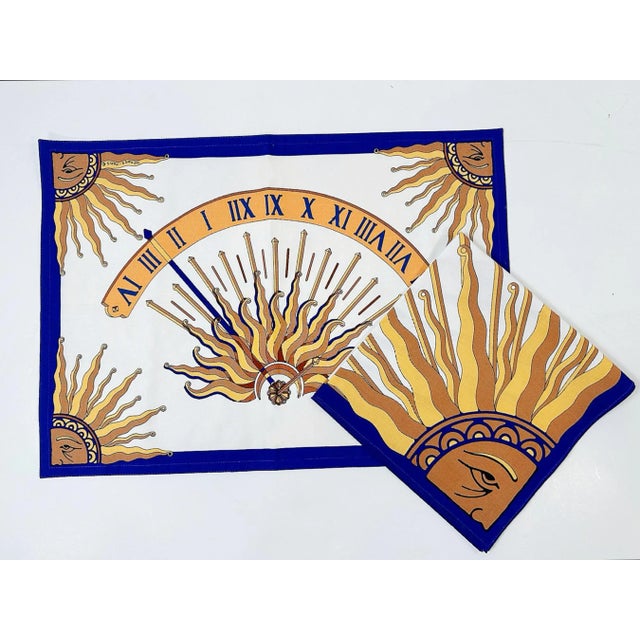 This is a fantastic vintage 1980's Hermes Placemat and matching napkin. The design is an iconic "Hermes" neoclassical Sun...