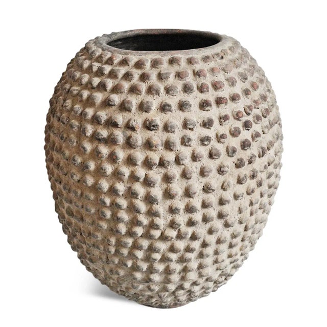 Authentic antique hand crafted Lobi clay pot. Original large Lobi terra cotta vessels are among the rarest and most prized...