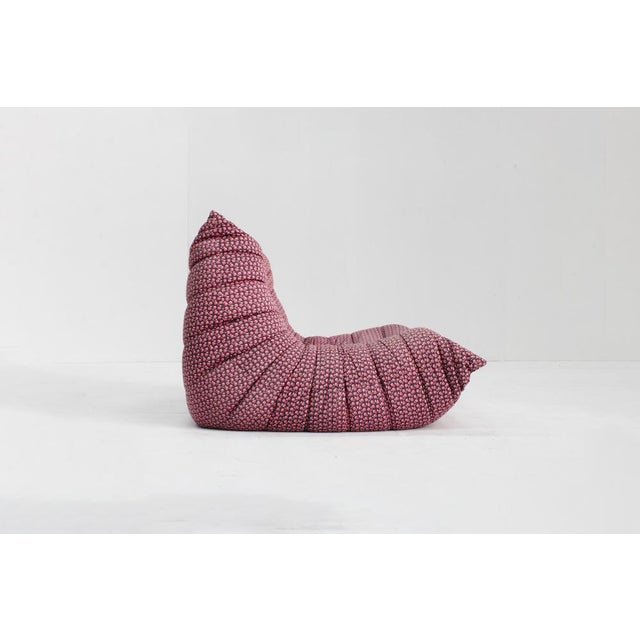 Vintage Togo lounge chair from Ligne Roset designed by Michel Ducaroy. This togo is in its original floral fabric is a...