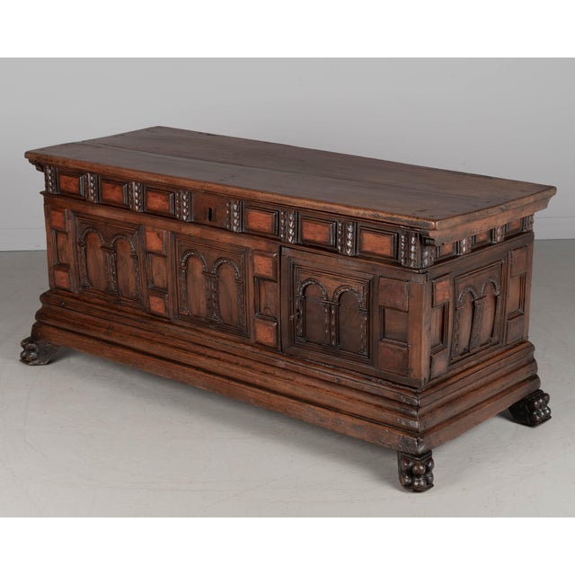 A suberb 18th century Italian Rennaissance style Baroque cassone, or marriage chest, made of solid walnut. Rich, intricate...