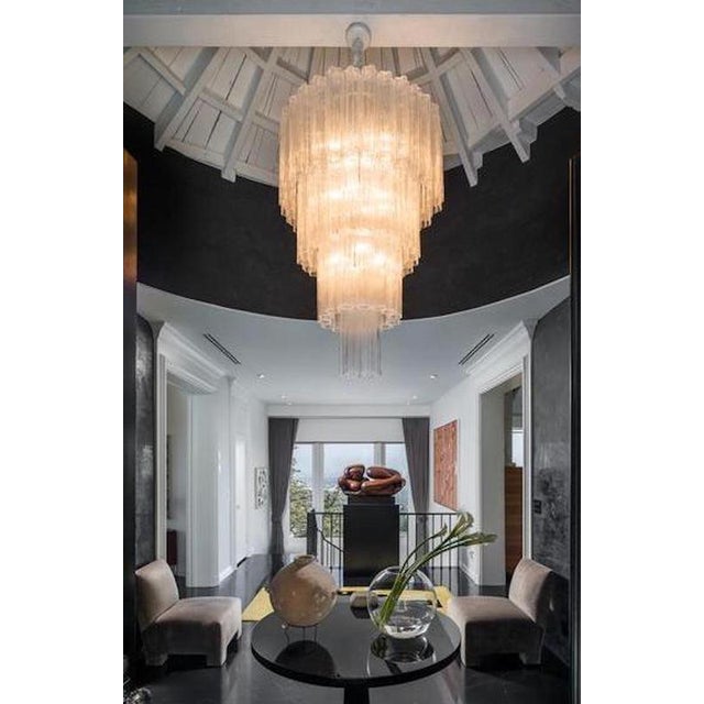 This extraordinary pair of chandeliers is composed by 78 'Tronchi' by 40 cm high. Eighteen-light bulbs E 14. Measure:...