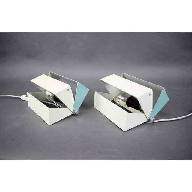 Rare pair of wall lamps designed by Hůrka for Napako and produced in Czechoslovakia during the 1970s. These sculptural...