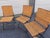 Vintage rattan French cafe dining set. Table and chairs are in very solid condition. Several broken reeds but does not...
