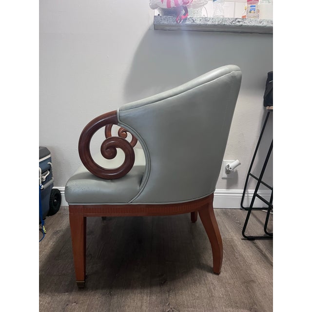 Therien Studio Workshops upholstered walnut armchair, workshop/frame stamped 20703.” - wear on both front corners pictured...