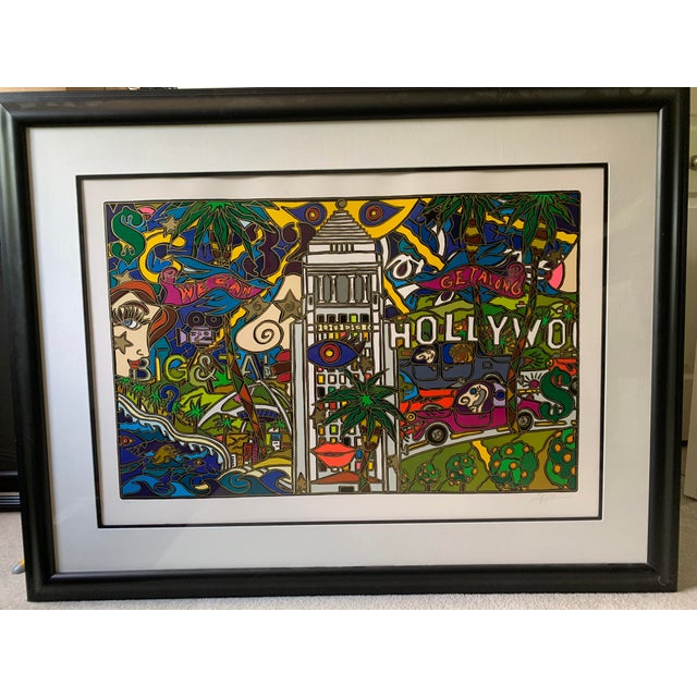 Colorful and playful - encompasses many LA & Hollywood references. Numbered 206 /250 and hand signed by artist. The art of...