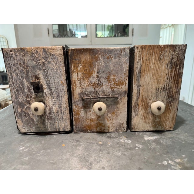 Super cool rustic/industrial storage boxes with original drawer pulls. An artistic fusion of bleached wood and zinc. Two...