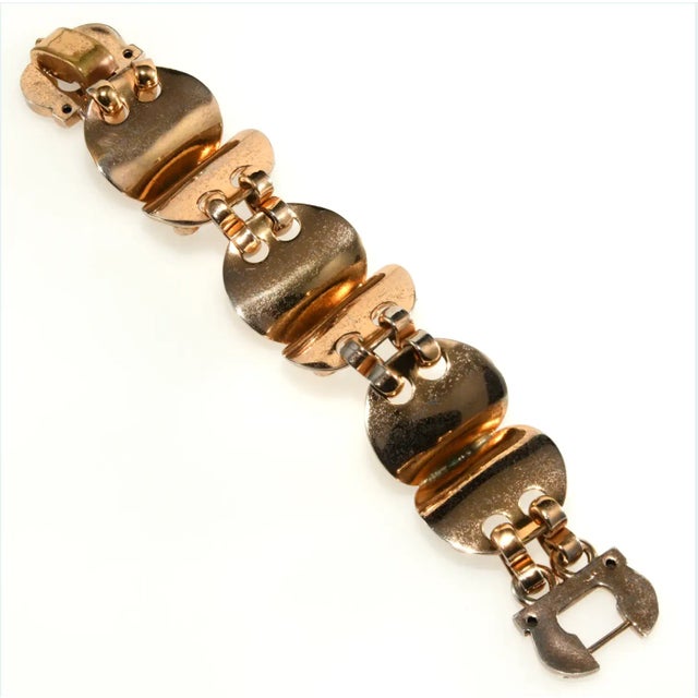 Amazing vintage bracelet likely dates to the late 1930s based on the retro styling and construction. It features amber,...