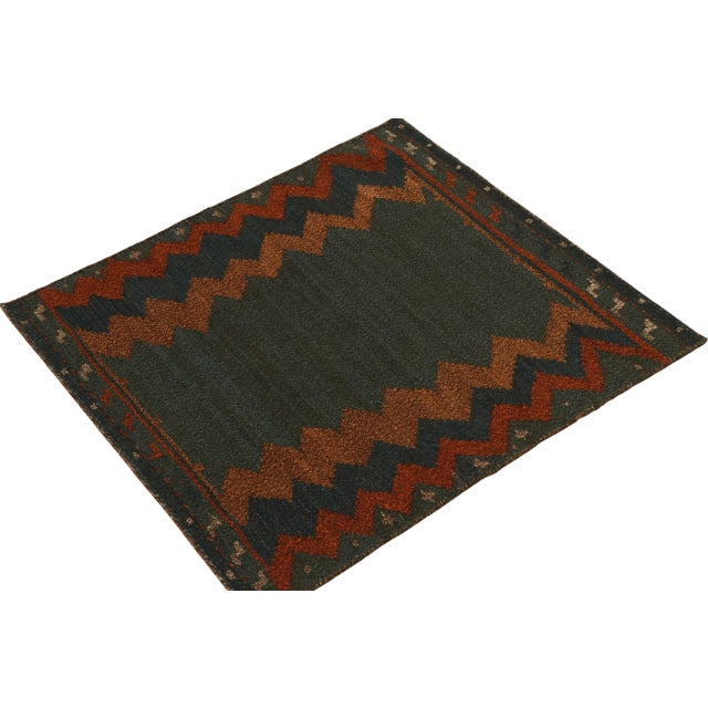 Handwoven in wool circa 1980-1990, from a rare vintage curation of small-sized Persian Sofreh Kilims now joining our...