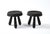Pair of beautifully crafted petite tripod stools by French designer Douglas Mont. A thick beveled seat sits on three...