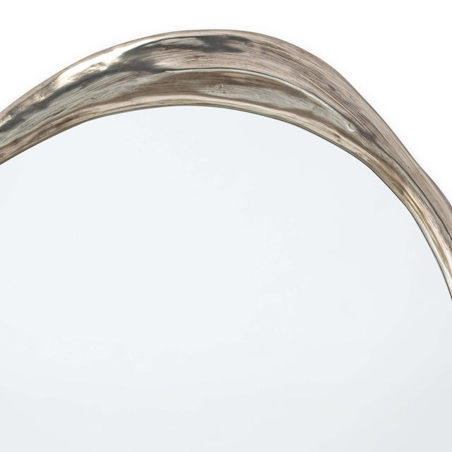 The beauty of the Ibiza Mirror is in its organic, hand carved shape. The slightly undulating circular mirror is complete...