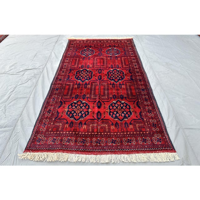 A finely hand-knotted Afghan Khal Mohammadi rug from Mazar-e-Sharif, woven in premium Biljik (Belgian) wool — lightweight,...