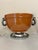 Beautiful Ceramic Carmel Brown Serving Bowl with Silver Rope Design. The metal handle rings and base could be aluminum....