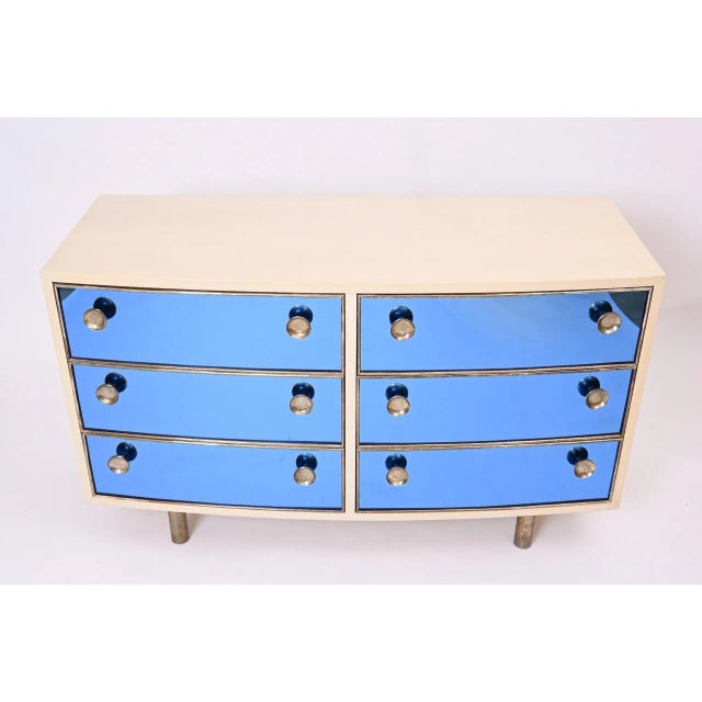Blonde wood. Blue crystal glass. Brass Curved front commode with six drawers. In style of Gio Ponti and Pietro Chiesa...
