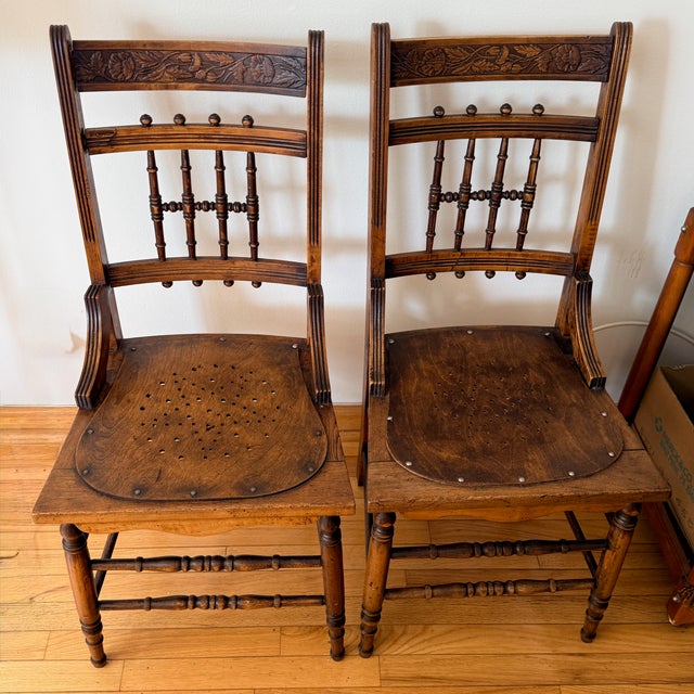 Pair Pressed Back Chairs with Leather Seats A lovely pair of small chairs with a perforated leather cover on the seat and...