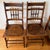 Pair Pressed Back Chairs with Leather Seats A lovely pair of small chairs with a perforated leather cover on the seat and...
