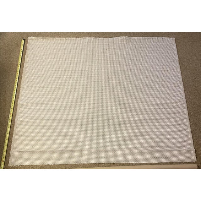 Osborne & Little's "Paxos" fabric in linen & white is a 55" wide 100% polypropolene indoor / outdoor fabric with 1/2"...