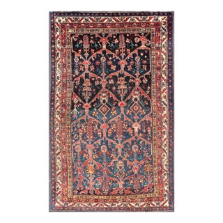 Antique Persian Bakhitari Colorful Rug With All-Over Floral Medallion Design For Sale