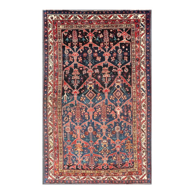 Antique Persian Bakhitari Colorful Rug With All-Over Floral Medallion Design For Sale