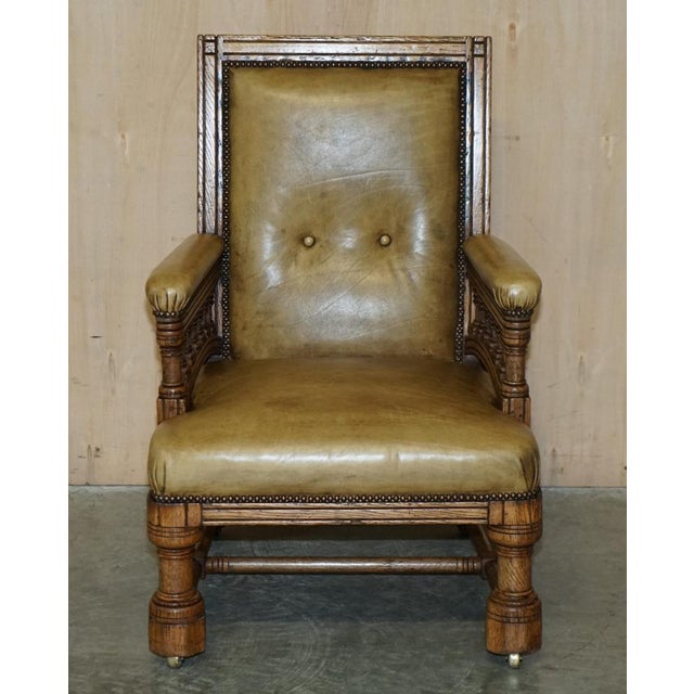 Lovely original early Victorian oak carved library reading armchair with hand dyed leather upholstery. This chair is very...