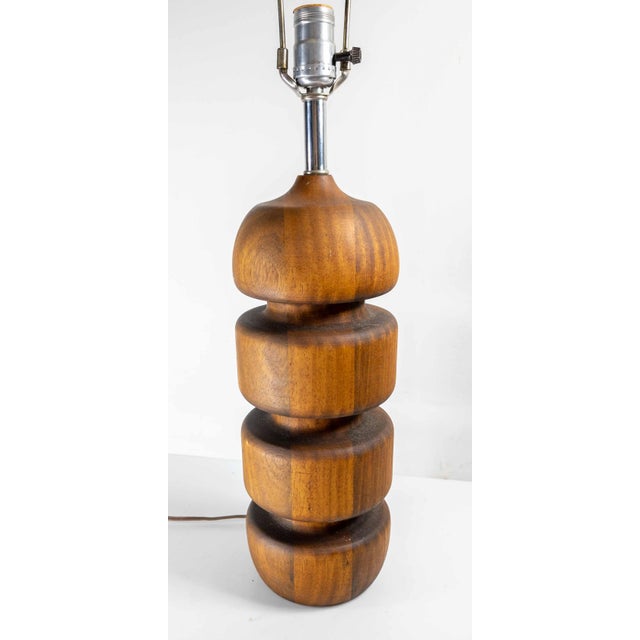 We are selling this great looking sculptural architectural table lamp. This lamp has great turned wood form with rounded...
