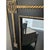 Offered is a striking statement wall mirror. This mirror features beveled glass, solid wood black frame with gold accents....
