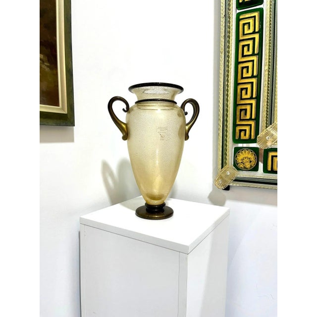 This traditional Vase exudes class and sophistication. Hand formed by Glass Master Gambaro of Murano, this piece also...