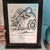 Feel the adrenaline rush and the passion of the racetrack through this remarkable piece. This vintage commemorative plaque...