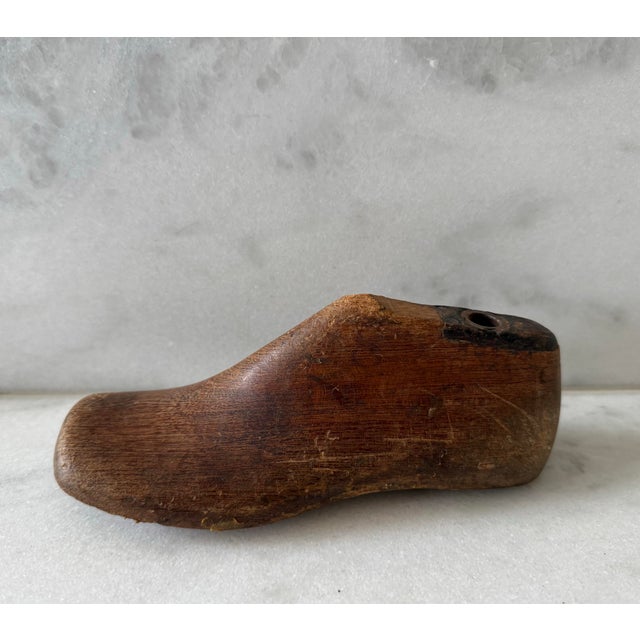 Vintage wooden child shoe form or shoe last, traditionally used for cobblers to hand-craft or repair leather shoes....