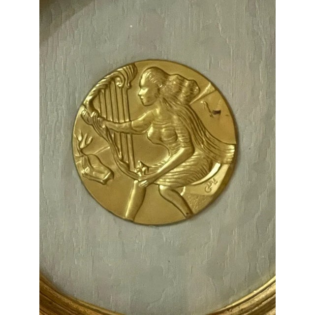 Embossed gilded bas-relief in 23-karat gold, Salvador Dali Title: the music Author: Salvador Dali Technique: embossed bas-...