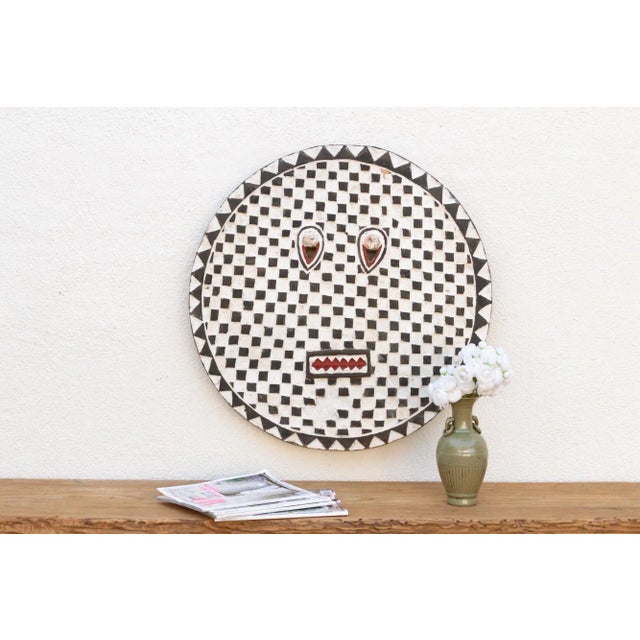 This lovely vintage Bobo sun mask is a must-have for collectors and enthusiasts of tribal culture. Hand-carved from wood...