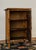 Late Victorian tortoiseshell bamboo single-door cabinet with woven rattan panel door and original hardware. Pine back,...