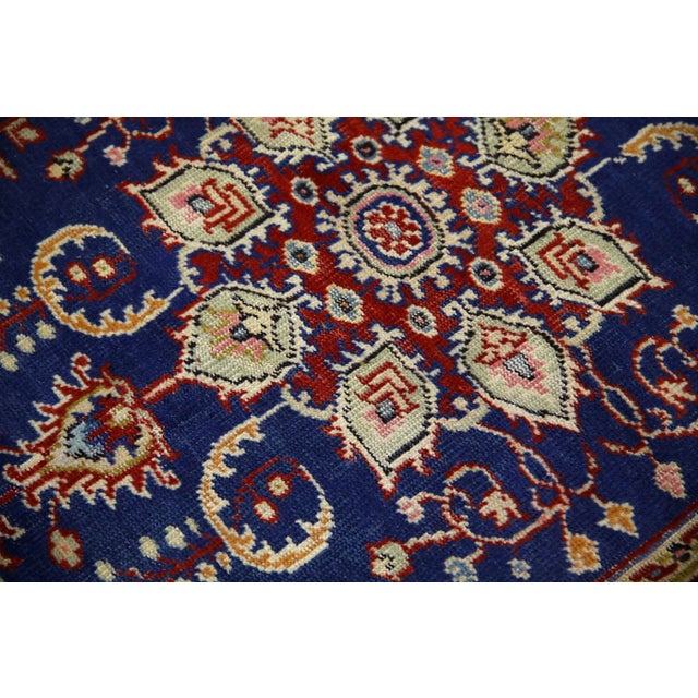 Introducing a one-of-a-kind vintage Turkish hand-knotted wool rug, carefully crafted by skilled artisans using traditional...