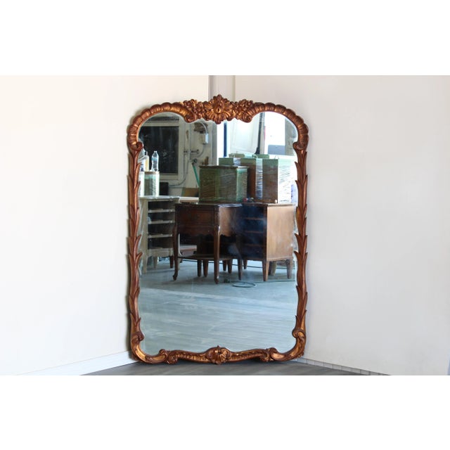 Vintage Hollywood Regency gilded mirror This mirror is in great vintage condition Dimensions; 32" Width x 2" Depth x 49"...