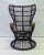 This vintage rattan peacock chair is a true eye-catcher. with its organic shapes and open woven backrest, it exudes a...