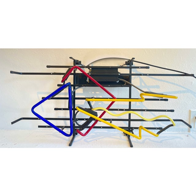 "Direction in Motion" is a sculptural neon composition that transforms the familiar arrow into an abstract visual...