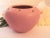 Discover the charm of this vintage matte pink pottery vase, complete with unique stem holes, crafted by Rosemeade in North...