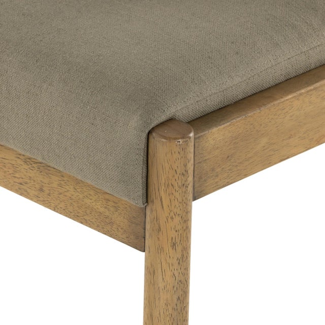 Style meets sensibility. Olive-colored high-performance fabric folds over solid parawood framing for a textural take on...
