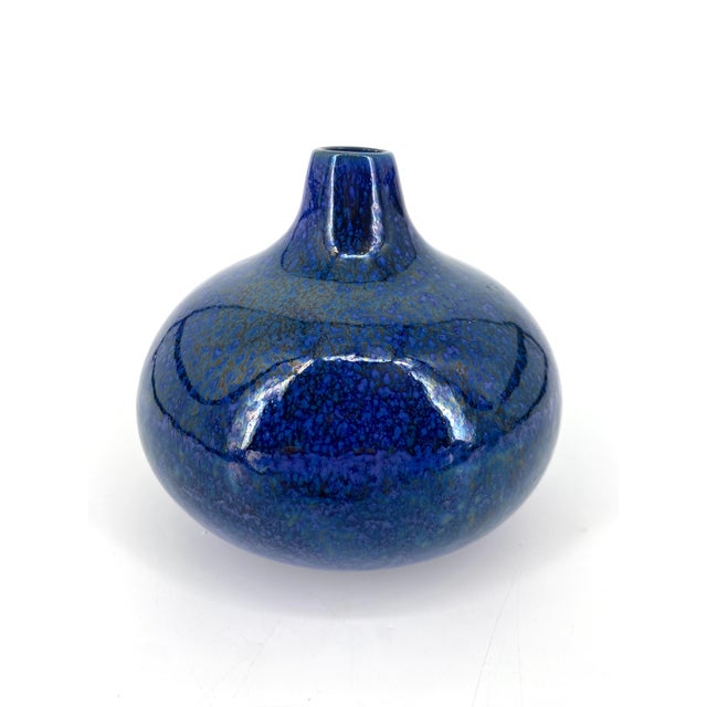 a vase * Manufacturer: Inge Böttger * Shape: Vase * Color: Blue * Material: ceramic, glazed * Origin: Germany Wandsbek...