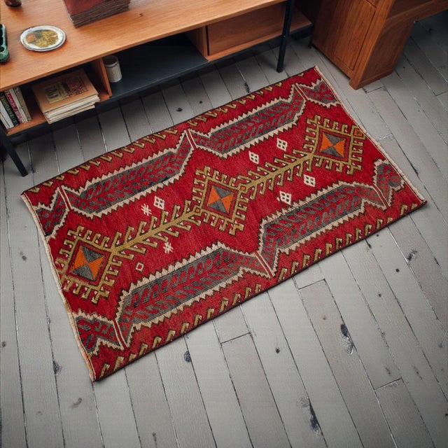 This vintage Kars kilim radiates the raw, geometric beauty of Eastern Anatolian flat-weave artistry. Its durable Soumak...