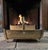 An early twentieth-century American fireplace log holder or firewood carrier dating to circa 1910–1930, constructed from...