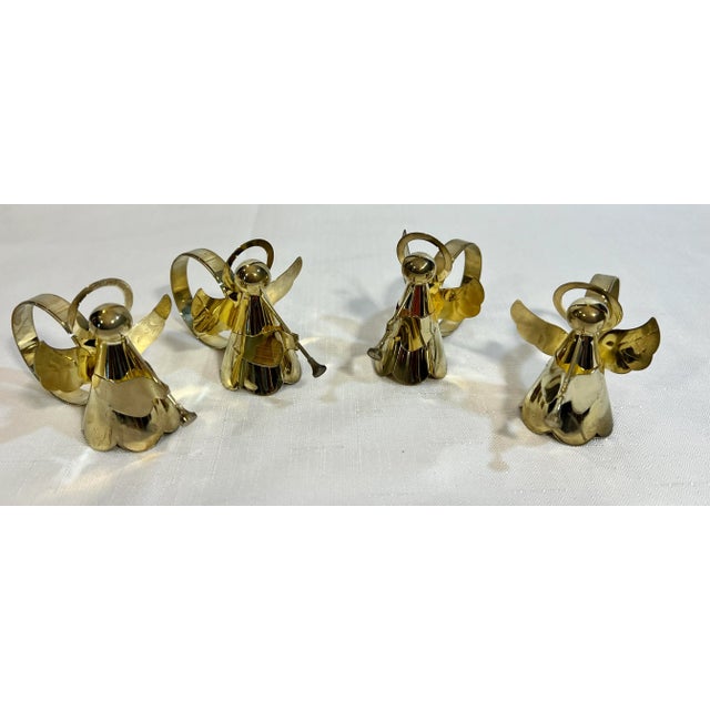 Allow me to introduce to you this wonderful Vintage Hollywood Regency Kemp Beatley Polished Brass Angel With Horn Napkin...