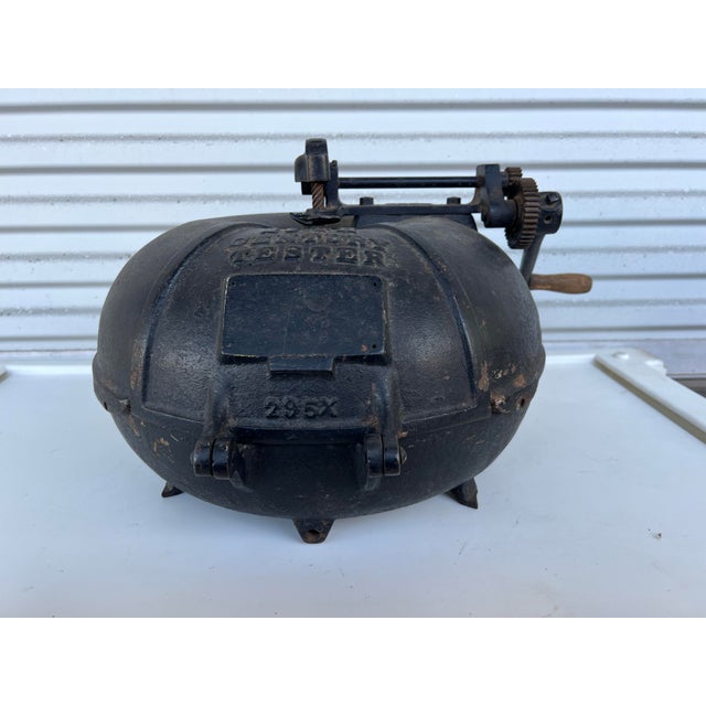 Add a striking element of early American industrial design to your space with this antique milk fat tester centrifuge....