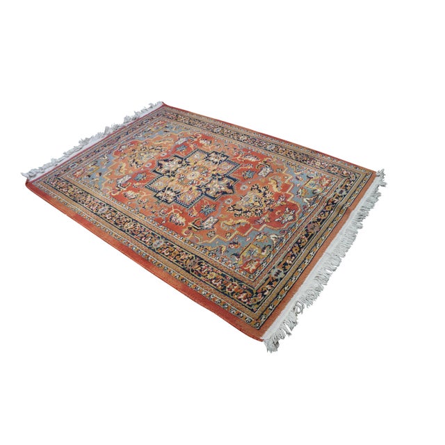 Vintage German Belgium Oriental rug runner featuring a floral medallion design in red / orange, blue, yellow, green/gray,...