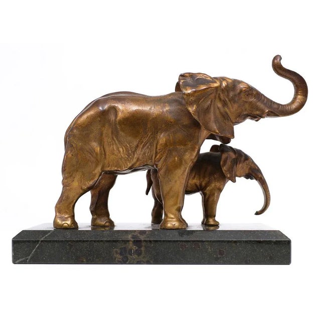 Mother and child, couple off elephants figurines must love this piece, nice patina, original Antique Gold color. Standing...