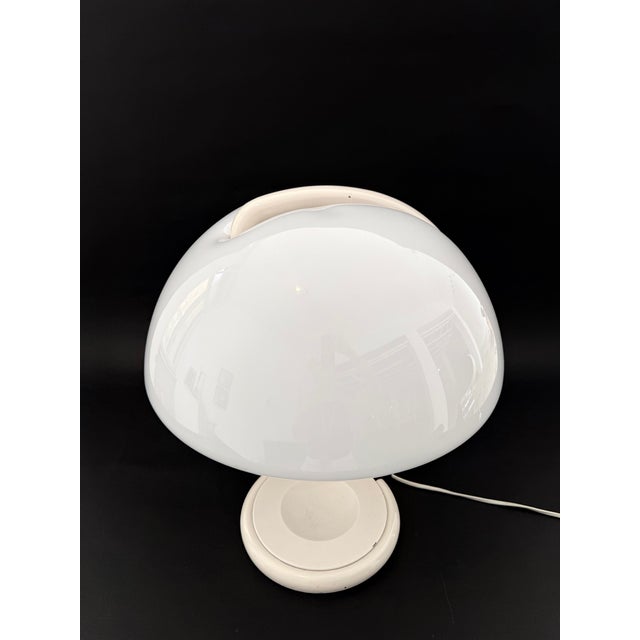 "Serpente" table lamp designed by Elio Martinelli for Martinelli Luce in the 1960s. This lamp is an icon of the Space Age...